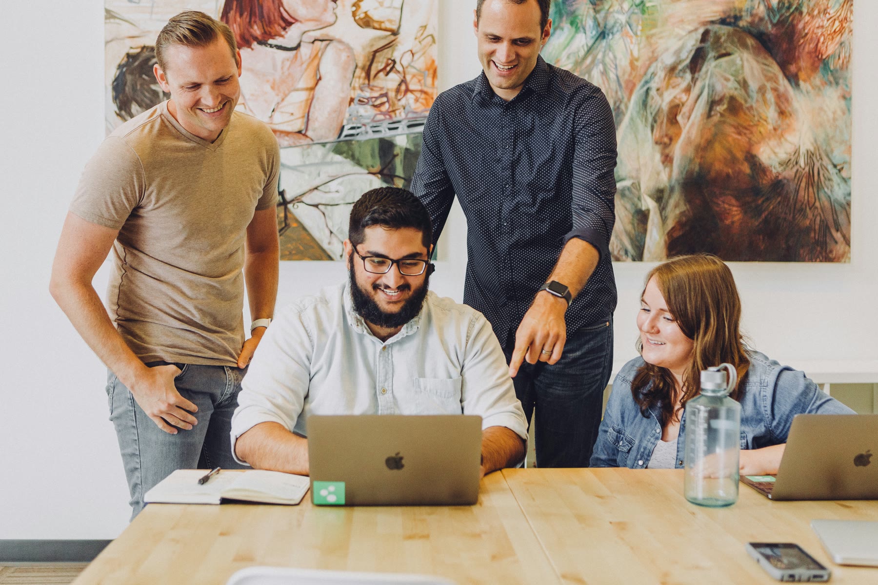 Team members working together in a studio